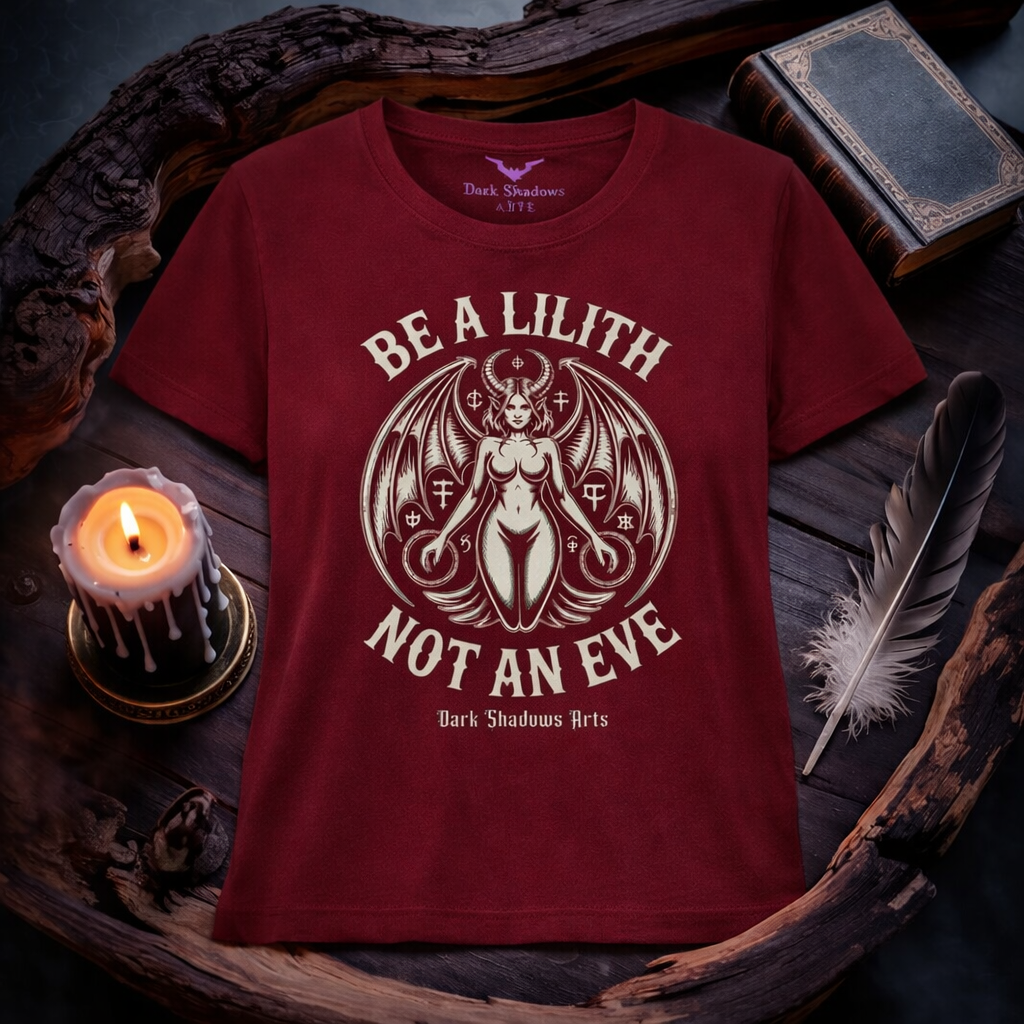 Lilith – Die Urfigur der Nacht Premium Organic Shirt Women in Burgundy von Dark Shadows Arts im dunklen Gothic Mockup mit Kerze, Feder und antikem Buch auf Holz
